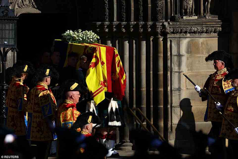 Pallbearers carry the coffin of Queen Elizabeth in Edinburgh