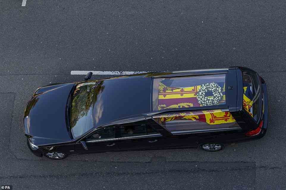 The hearse carrying the coffin of Queen Elizabeth II makes its way to Edinburgh Airport
