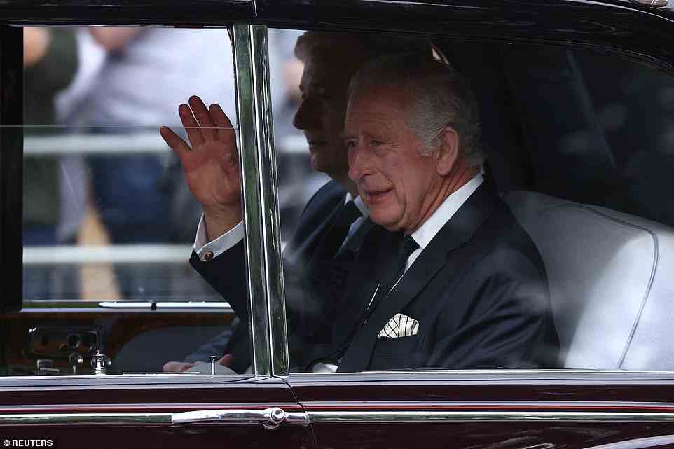 King Charles arrives at Buckingham Palace in London today as Britain continues to mourn Queen Elizabeth II