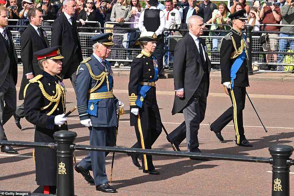 The Queen's four children walked side-by-side behind the Monarch's coffin/ King Charles, Princess Anne and Prince Edward were in their military uniform. Prince Andrew wore a morning coat