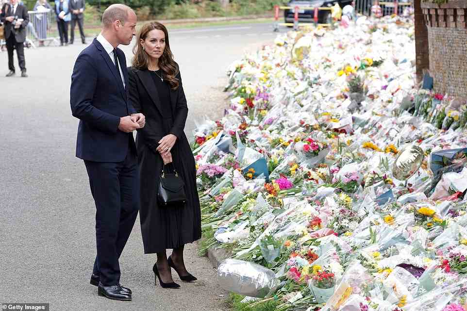 Thousand of flowers, toys and cards have been left outside Sandringham House in recent days