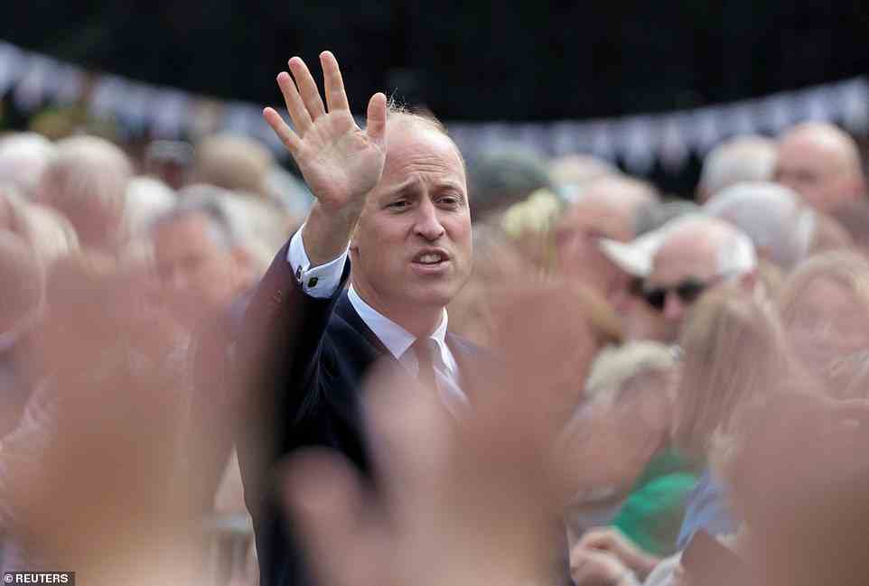 Prince William waves to well-wishers at Sandringham today