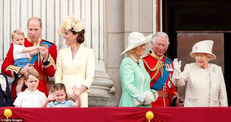 Learning by example: All eyes were on the Royal Family during Trooping the Colour in 2018, but it was Princess Charlotte who stole the show. The cheeky three-year-old was caught on camera as she watched her great-grandmother the Queen waving at the crowd... then decided to follow suit (pictured)