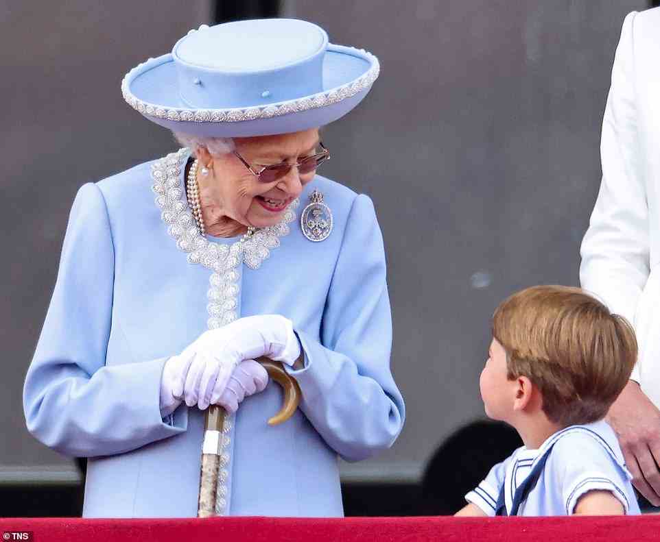 Queen Elizabeth II smiled warmly at her four-year-old great-grandson Prince Louis at the flypast presumably trying to distract him from the noise
