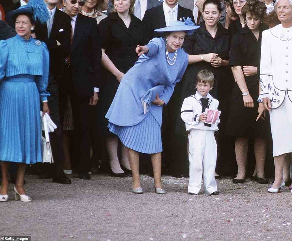 The moment before the Queen lost her poise to grab a young Prince William as he ran after a carriage following the wedding of the Duke and Duchess of York as they set off on honeymoon in 1986