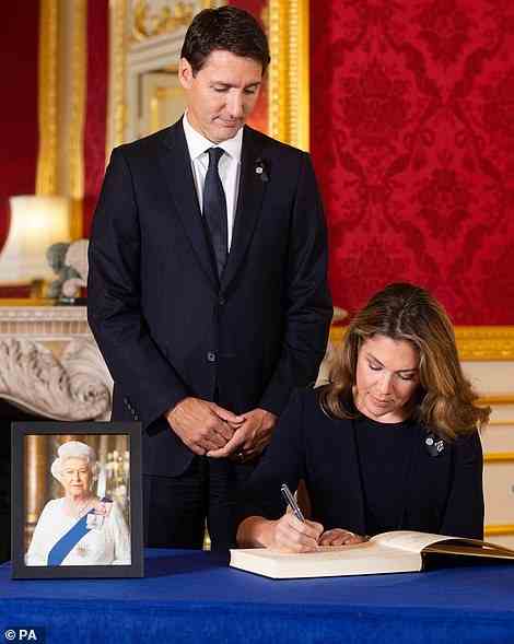 Pictured: Prime Minister of Canada Justin Trudeau and his wife Sophe Trudeau signing the book of condolences