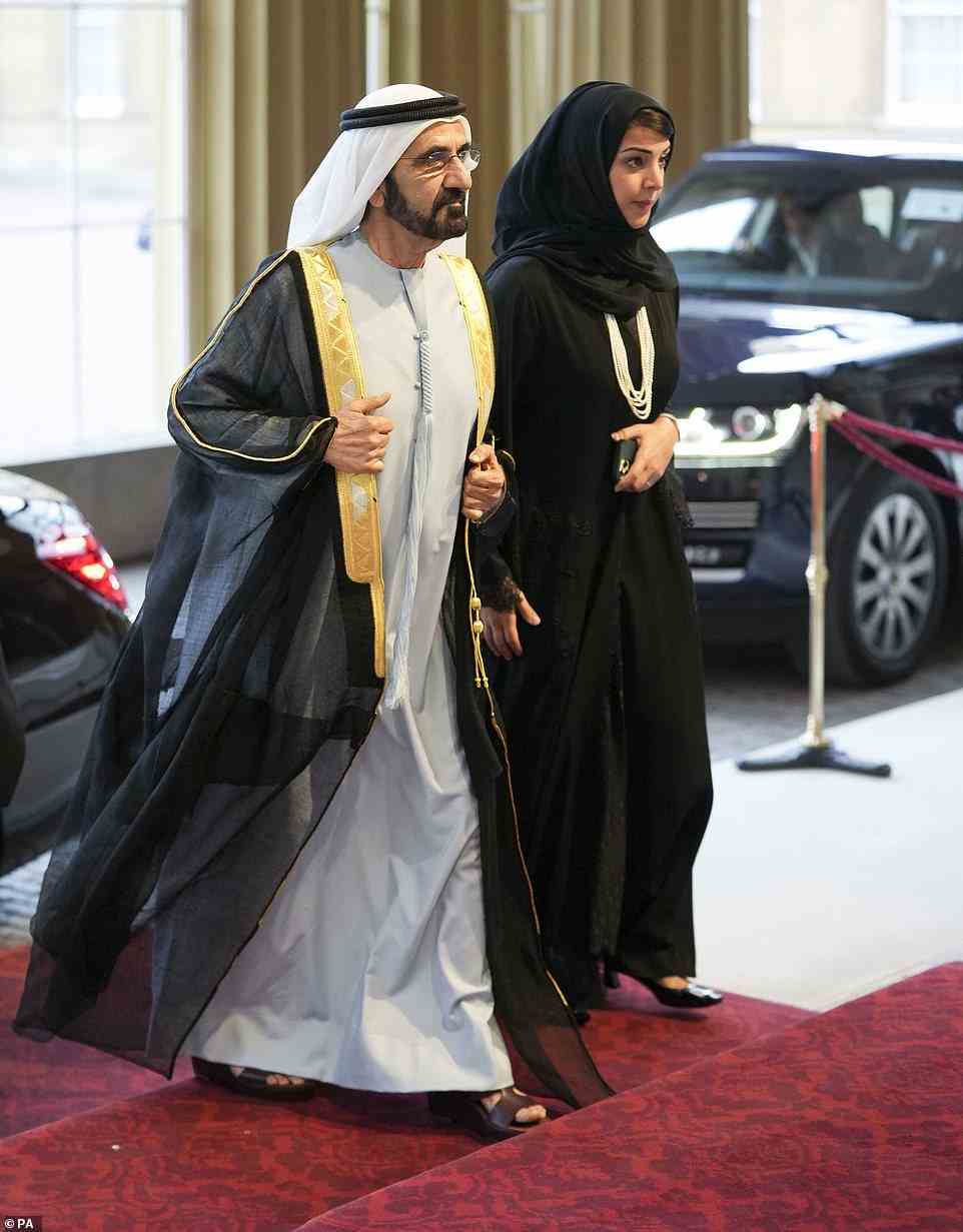 Sheikh Mohammed bin Rashid Al Maktoum (left), vice president, prime minister, and minister of defence of the United Arab Emirates (UAE), arrives for a reception hosted by King Charles III