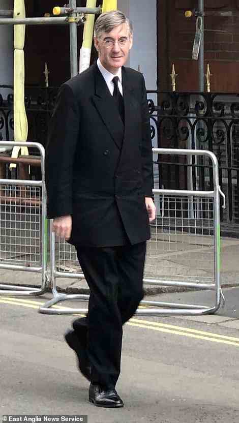 Business minister Jacob Rees-Mogg arrives at the Buckingham Palace reception