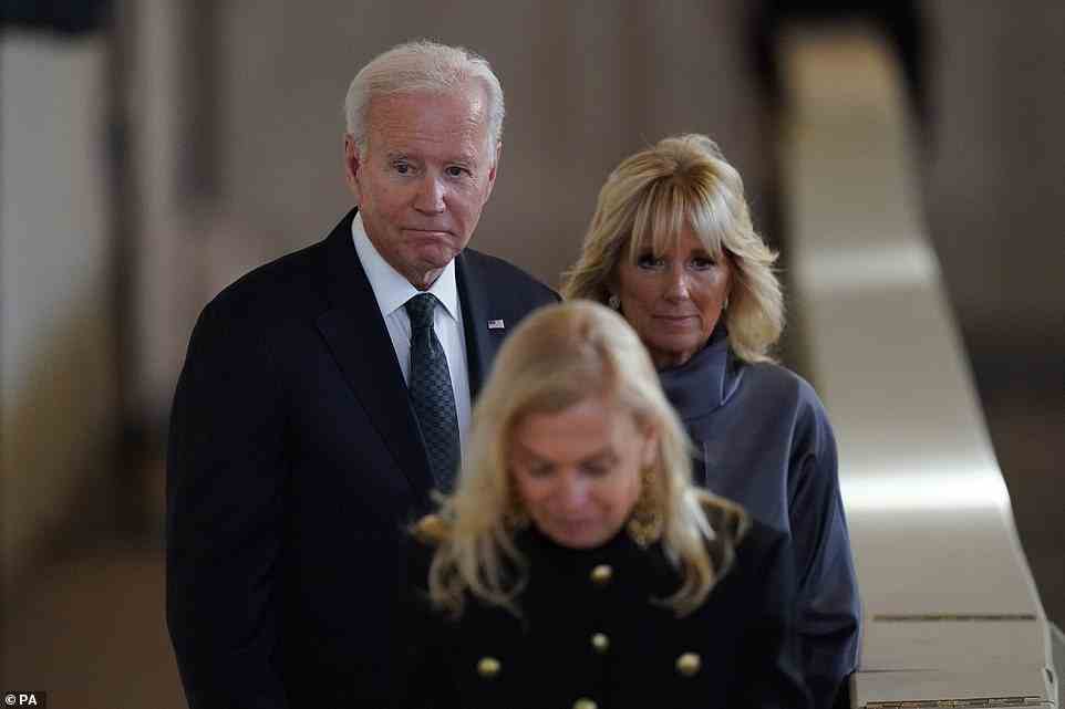 US President Joe Biden and First Lady Jill Biden view the coffin of Queen Elizabeth II, lying in state on the catafalque in Westminster Hall, at the Palace of Westminster, London