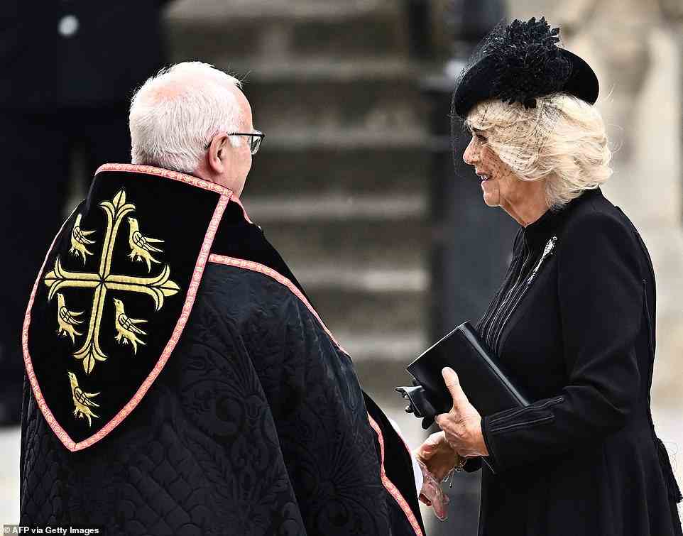 Camilla was greeted by the members of the Church, on the steps of Westminster Abbey ahead of today's historical ceremony
