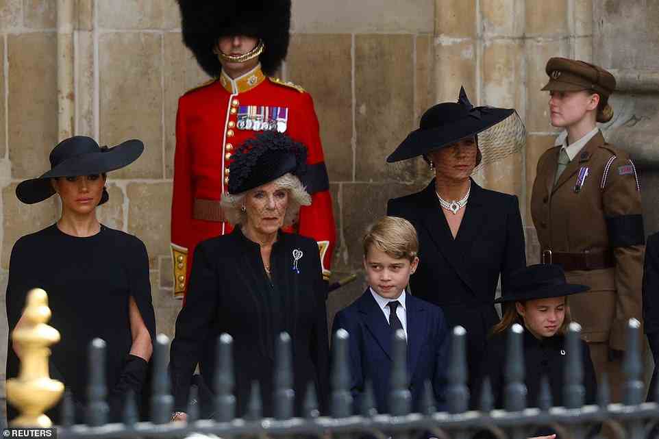 Prince George stood close to his grandmother after the emotional ceremony, while his mother and his aunt looked deep in thought