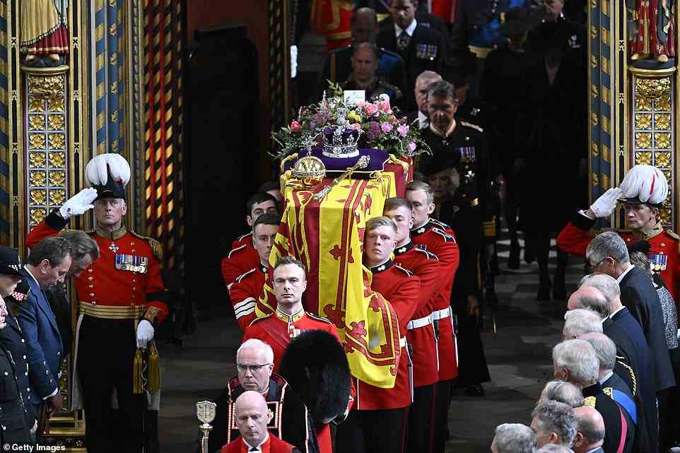 The Queen Consort accompanied the King as he led his family outside of Westminster Abbey, behind the Queen's coffin, at it departed