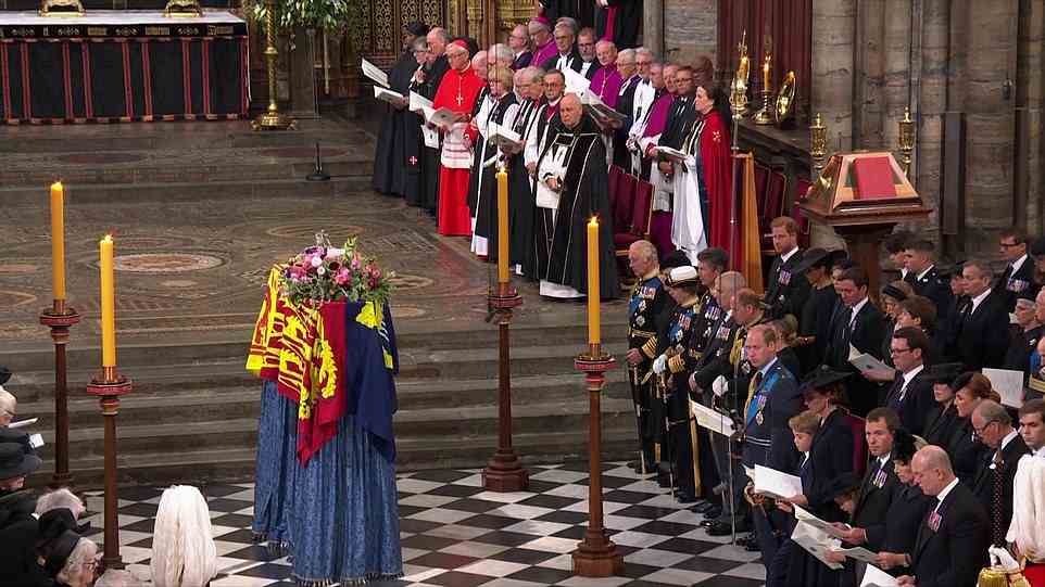 The royal family, led by Prince Charles and the Queen Consort, stood in silence as they reflected in the last minute of the Monarch's state funeral