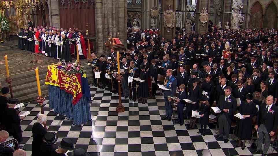 The Queen Consort, sat to the left of the King, sang the royal hymn with the other members of the royal family attending the late Monarch's funeral