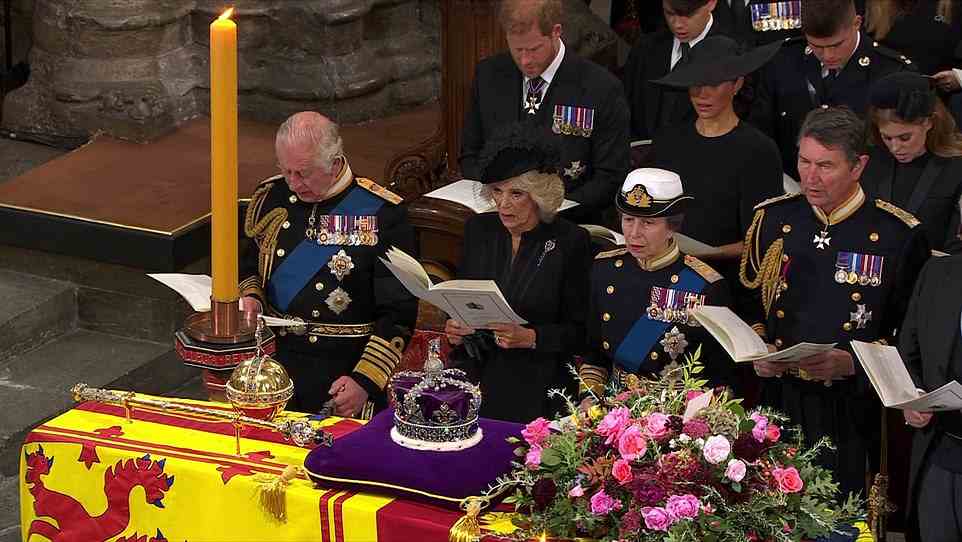 The Queen Consort stood by King's side during the emotional service at Westminster Abbey today as they started the ceremony by singing hymns