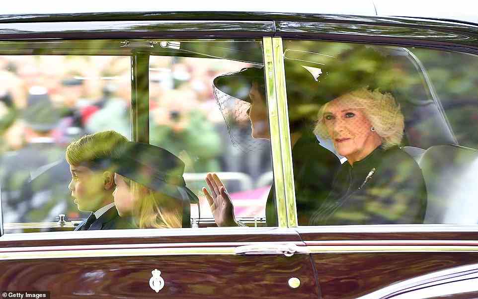 The Queen's great grandchildren sat in front of their mother, the Princess of Wales and the Queen Consort as they made their way to Westminster Abbey in the claret royal car