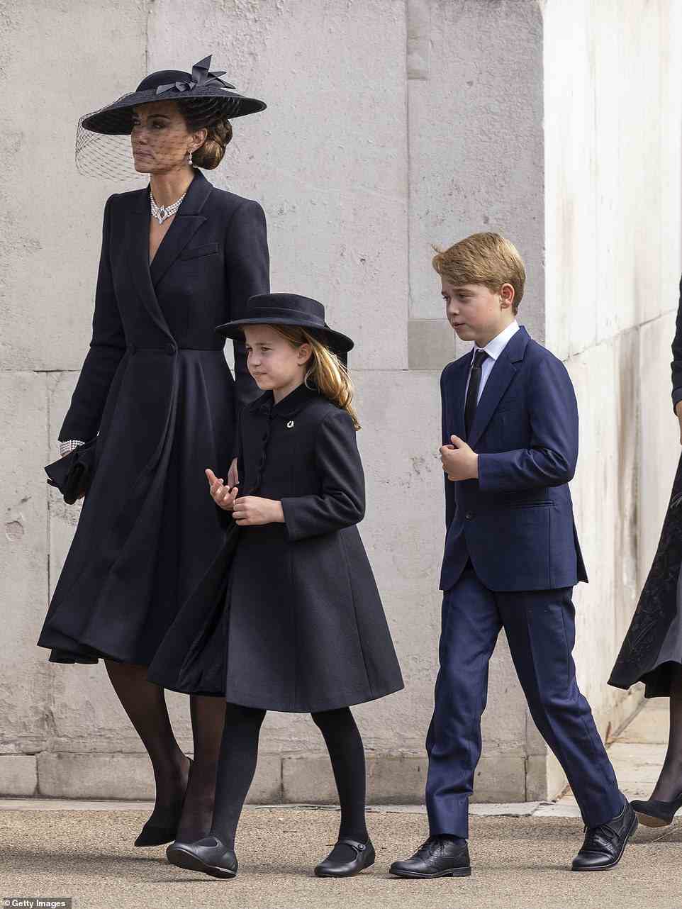 The Princess of Wales, Prince George and Princess Charlotte at Wellington Arch after the funeral at Westminster Abbey