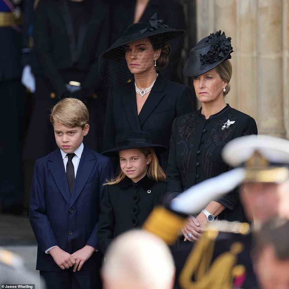 The Princess of Wales and her children Prince George and Princess Charlotte leave Westminster Abbey with the Queen Consort