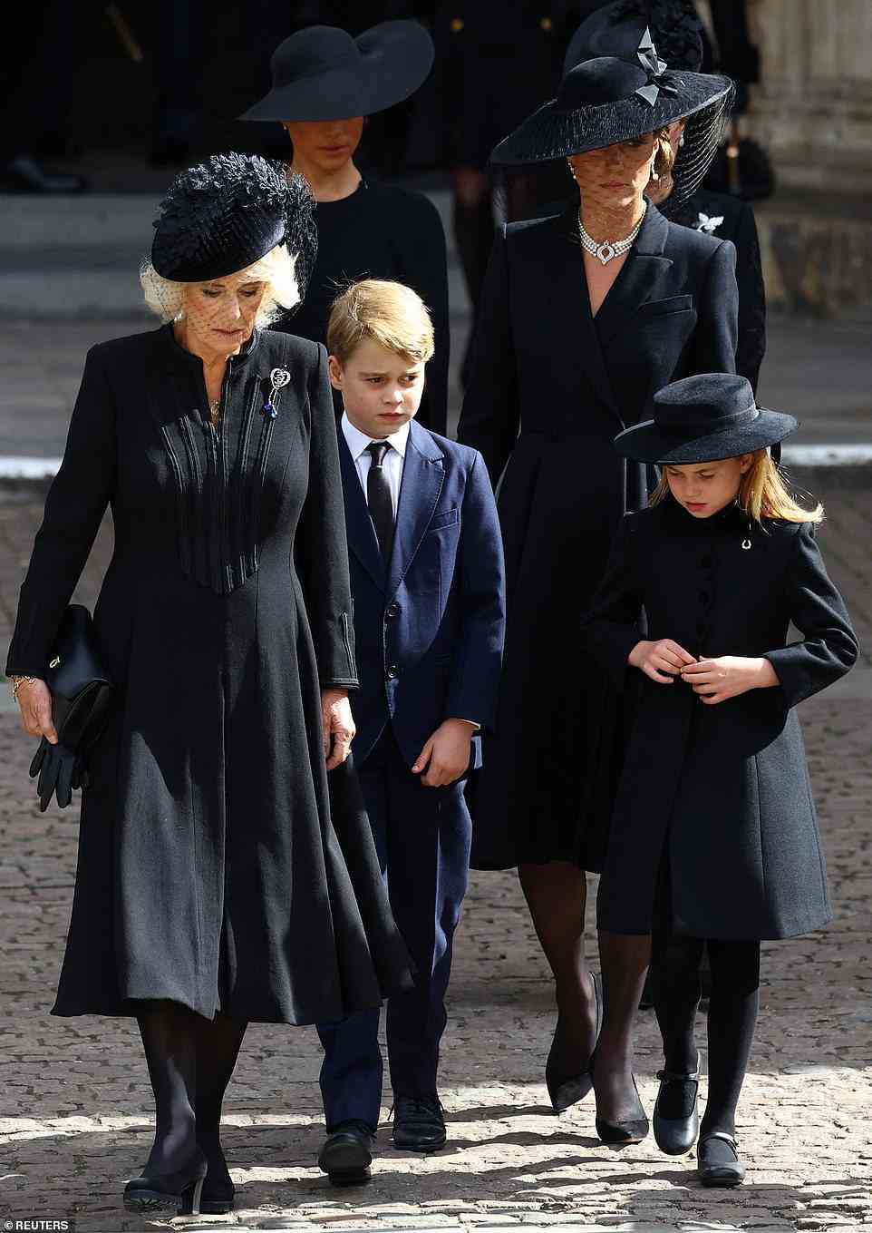 The Queen Consort led the Princess of Wales and her children, and the Duchess of Sussex and the Countess of Wessex, from Westminster Abbey to join the procession by car