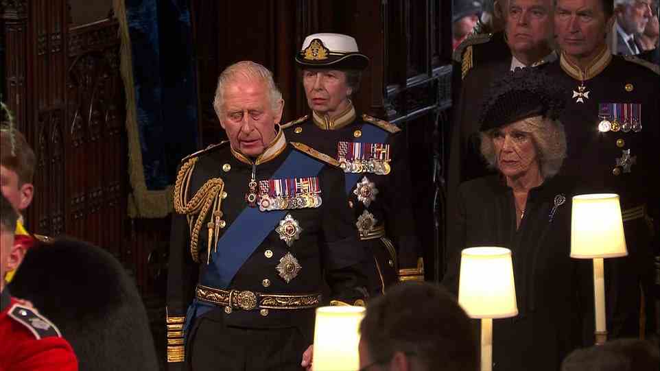 Prince Charles arrives at St George's Chapel with the Queen Consort as he prepares to lay his mother to rest