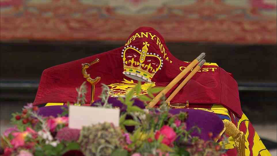 The Queen's Company Camp Colour of the Grenadier Guards banner lies on the Queen's coffin after the crown jewels were removed