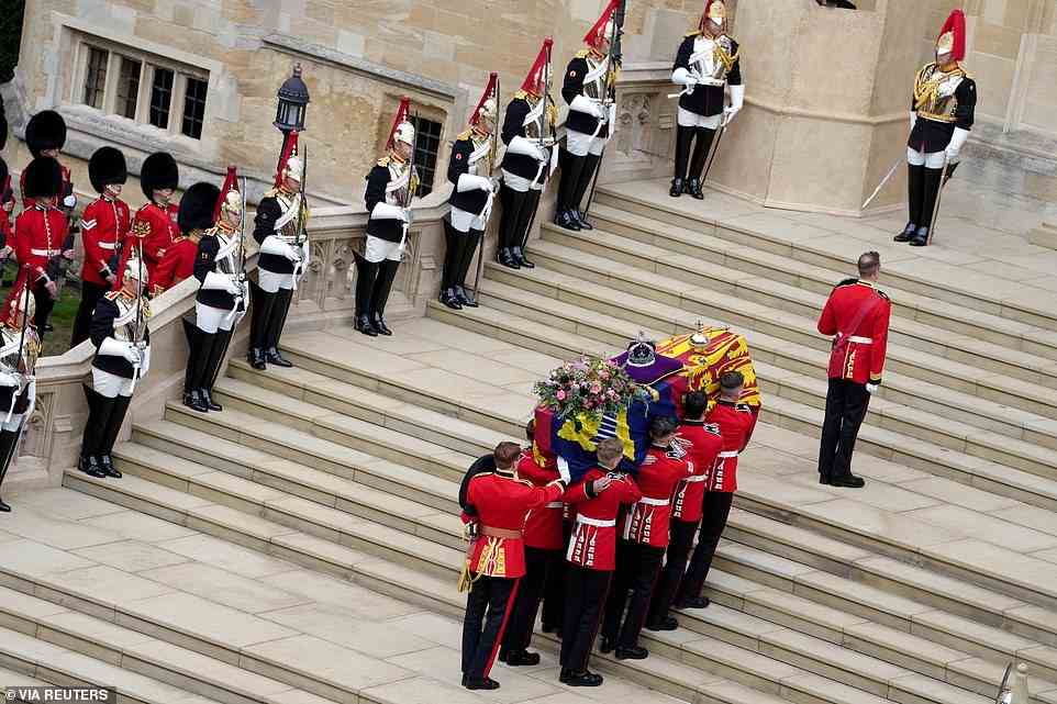 The pallbearers expertly carry the Queen into the chapel where she will be laid to rest