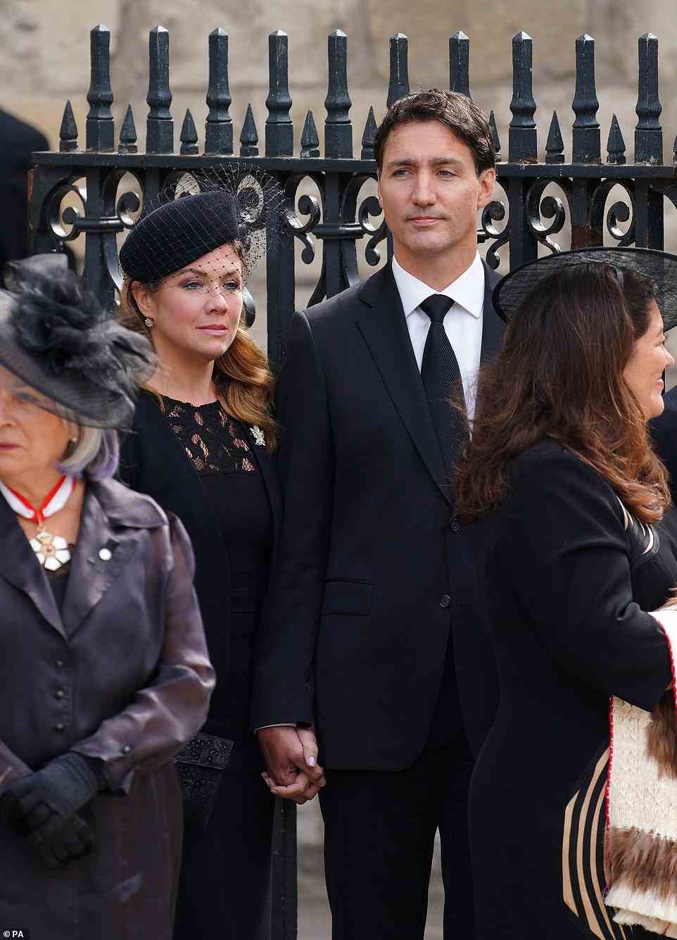 Trudeau and his wife pictured outside Westminster Abbey following the funeral of Queen Elizabeth II