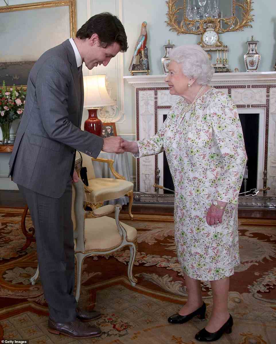 Canadian Trudeau shaking hands with the late monarch during a private audience at Buckingham Palace on April 16, 2018