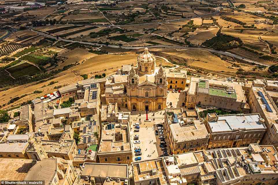 The luxurious Xara Palace hotel in the ancient Maltese city of Mdina, pictured, is offering a 60-day stay for £67 a night