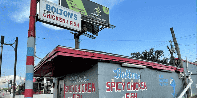 Bolton's is a popular no-frills East Nashville hot chicken joint. A sign above the kitchen warns, "Please wash your hands before rubbing your eyes or your babies!"