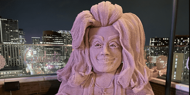 White Limozeen is a new Dolly Parton-themed rooftop bar at The Graduate hotel in Nashville. The decor includes a 10-foot-tall bust of Parton crafted from chicken wire by Tennessee artist Ricky Pittman. 