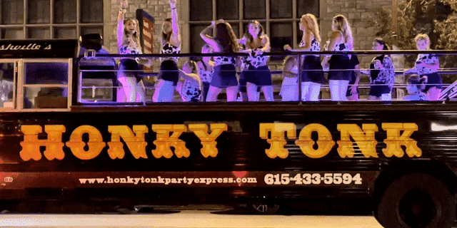 The Honky Tonk Party Express rolls down Broadway in Nashville, Friday, August 26, 2022. Nashville is one of America's top destinations for bachelorette parties; an array of party buses and other mobile entertainment are options. 