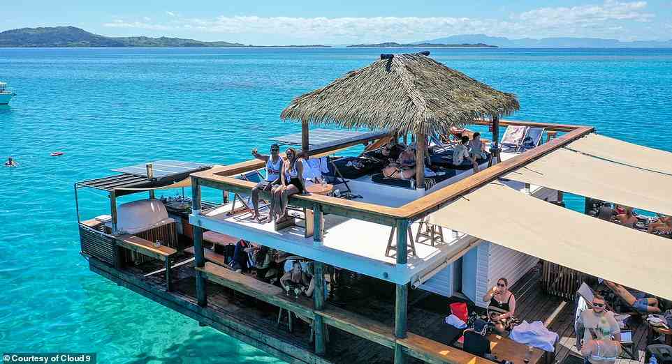 The floating bar can accommodate up to 100 guests and transfers run daily