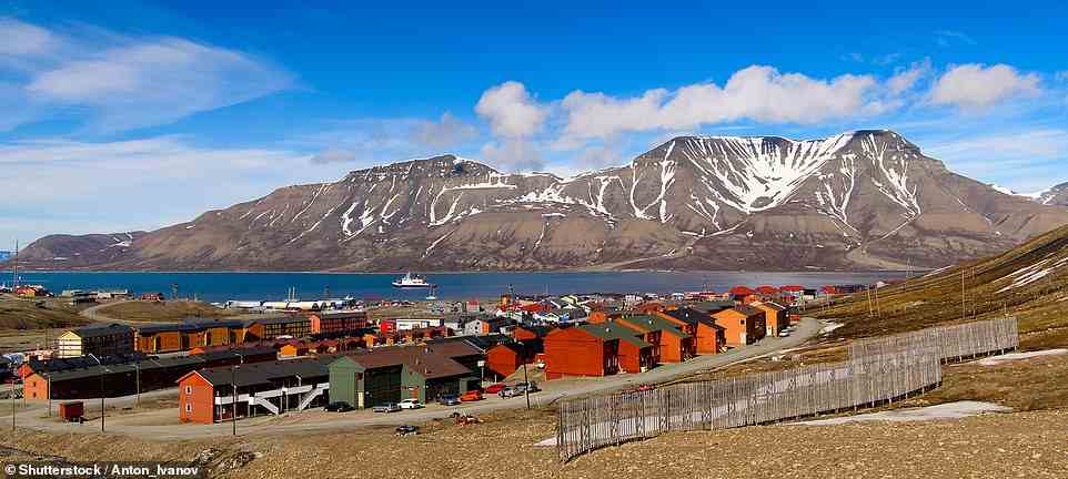 A view (stock image) over the city of Longyearbyen, where the team spent two days 'stocking up on snacks, foot warmers and gas for the camping stoves'