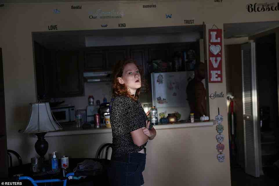 PUNTA GORDA: Lilly Indarjit, 16, stands in her damaged home in the aftermath of Hurricane Ian in Punta Gorda, which was badly flooded