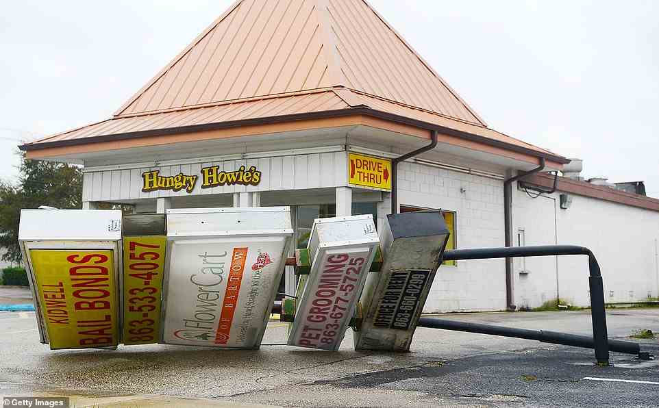 BARTOW: A commercial sign was seen bent over outside of a drive-thru restaurant in Bartow, after being hit by high speed winds