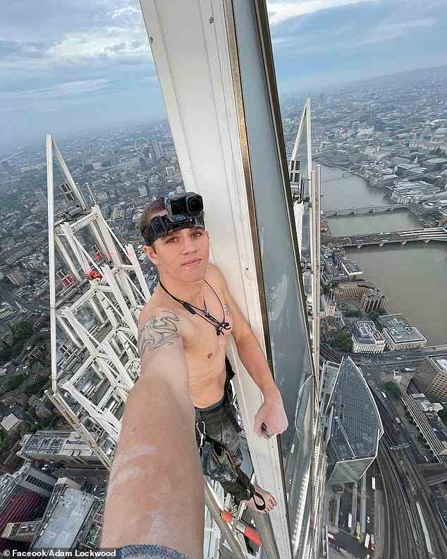 Es wird angenommen, dass der Draufgänger Adam Lockwood (heute abgebildet), 21, heute Morgen gegen 5 Uhr morgens erfolgreich das höchste Gebäude Großbritanniens erklommen hat, bevor er ein Selfie auf dem Gipfel der Wolkenkratzer machte