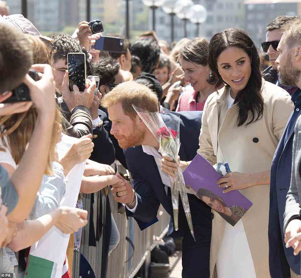 The new book claims that during the royal tour of Australia in October 2018, Meghan did not understand why she had to shake people's hands or do walkabouts
