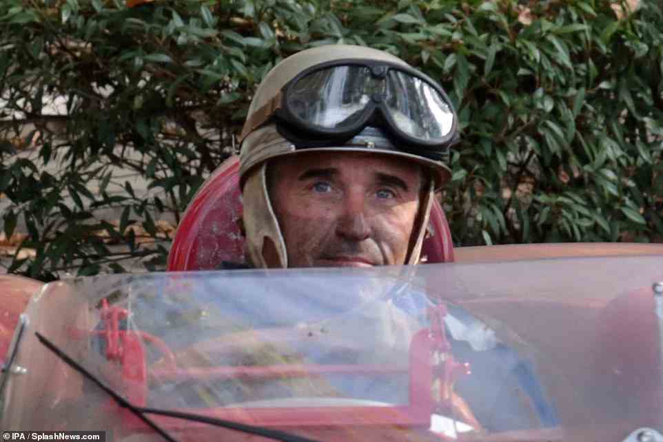 Schneidig: Patrick Dempsey, 56, sah am Dienstag am Set von Ferrari in Modena, Italien, hinter dem Steuer eines Sportwagens schneidig aus