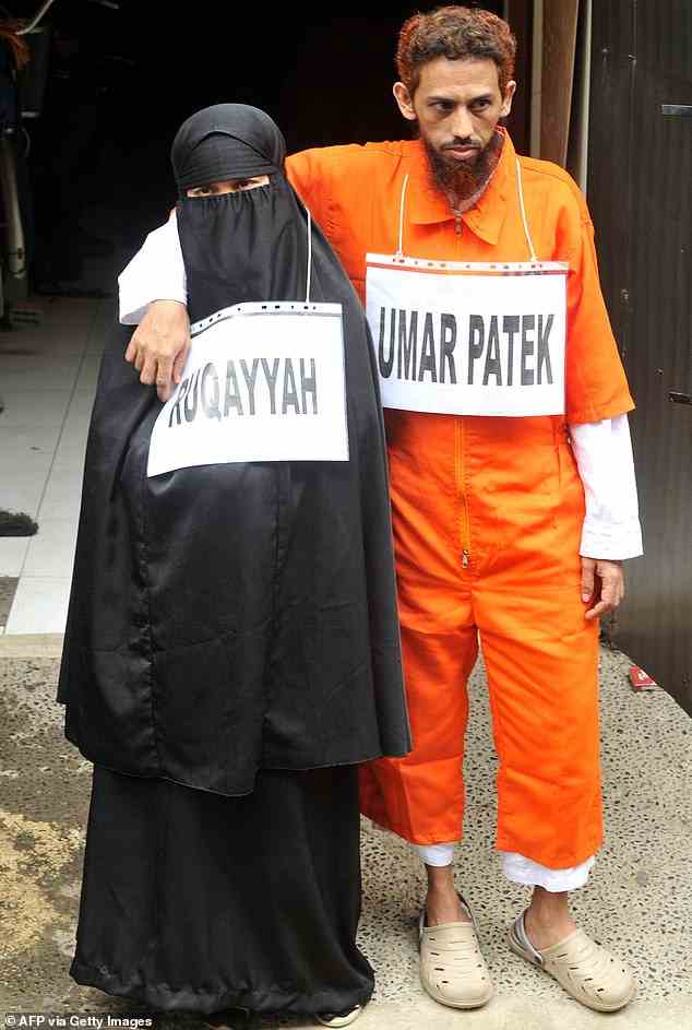 Umar Patek, the explosive expert who mixed the chemicals for the Bali bombs (above with his wife), and who is slated to be released from prison after serving just half of his sentence