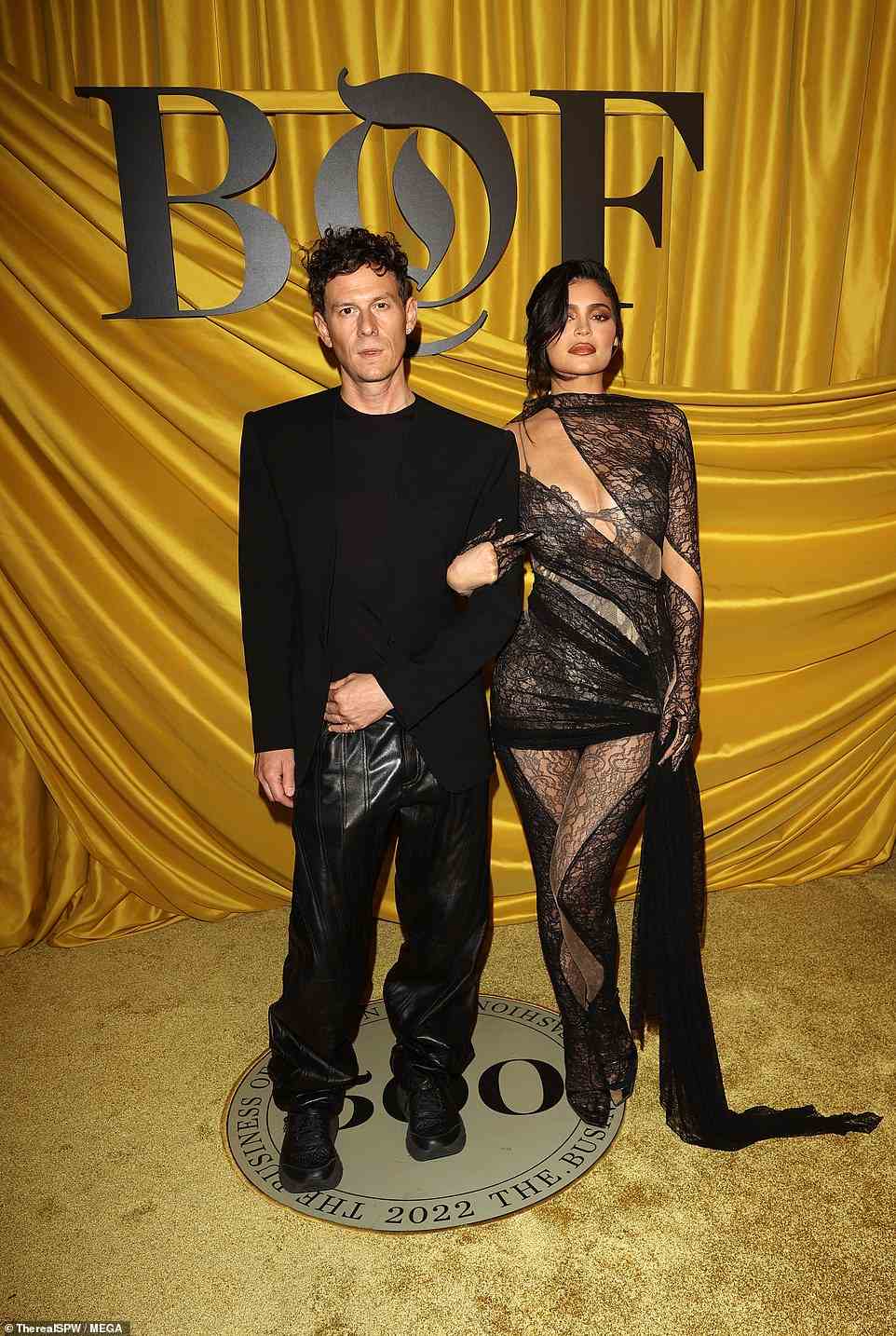 Pals: She posed on the carpet with a pal who was dressed in black for the evening