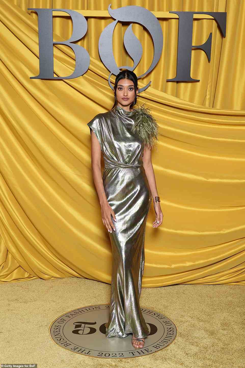 Wow! Neelam Gil also stunned in a metallic number, with a high neck and feathered design