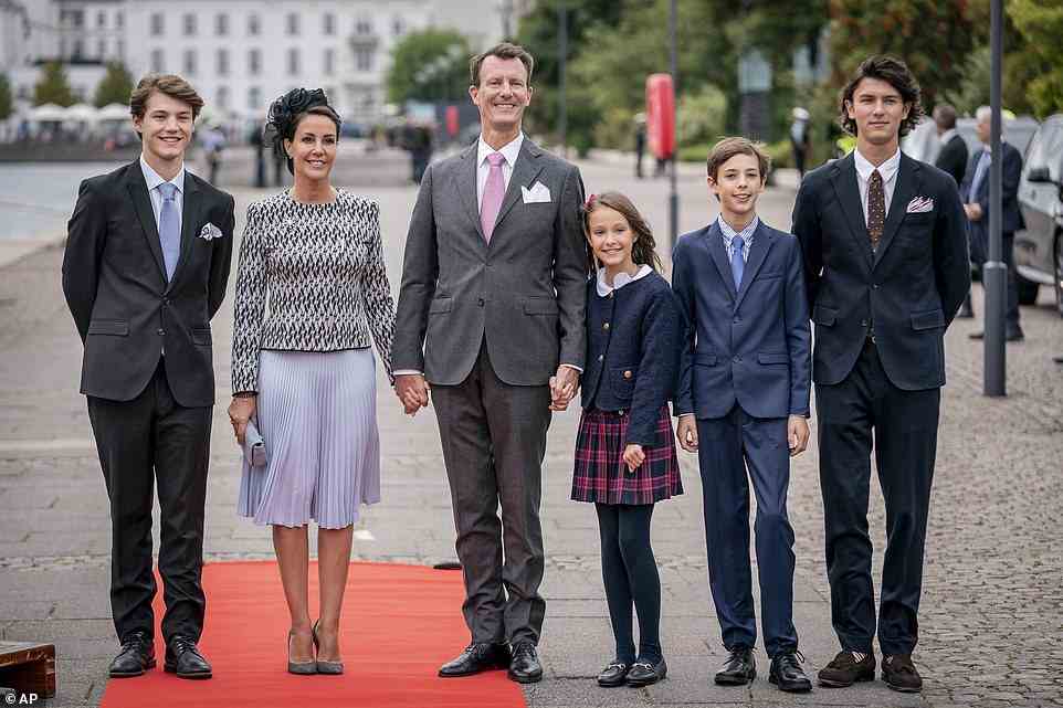 Tensions began to grow last week in the Danish Royal Family after Queen Margrethe, declared Prince Joachim's children, Prince Nikolai, 23, Prince Felix, 20, Prince Henrik, 13, and Princess Athena, 10, were to be counts and countesses as of 1 January 2020 and known as Their Excellencies, rather than their Royal Highnesses (pictured with their parents on the Queen's golden Jubilee in September)