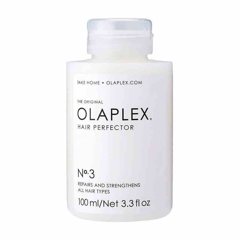 A white bottle of the Olaplex Hair Perfector No. 3 Repairing Treatment on a white background