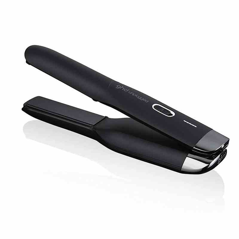 The black GHD Unplugged Styler hair straightener on a white background