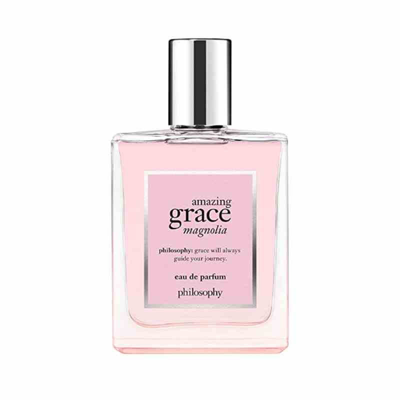 A pink bottle of the Philosophy Amazing Grace Magnolia Eau de Parfum on a white background