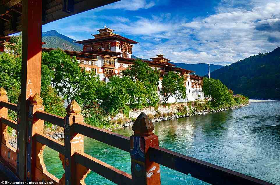 Tradition: The Punakha Valley is guarded by its fine 17th-century Dzong (pictured), a formidable fortress/temple where monks guard holy relics