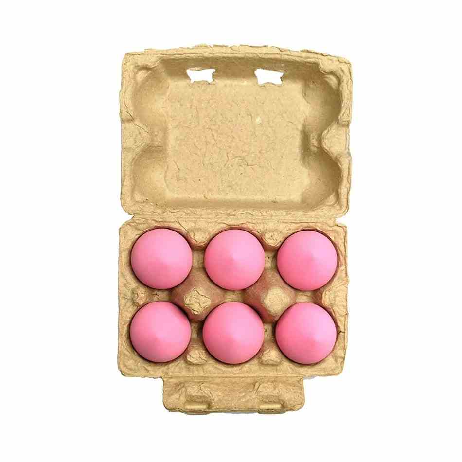 Beauty Bakerie Blending Eggs Schönheitsschwämme Eierkarton gefüllt mit rosa Schönheitsschwämmen auf weißem Hintergrund