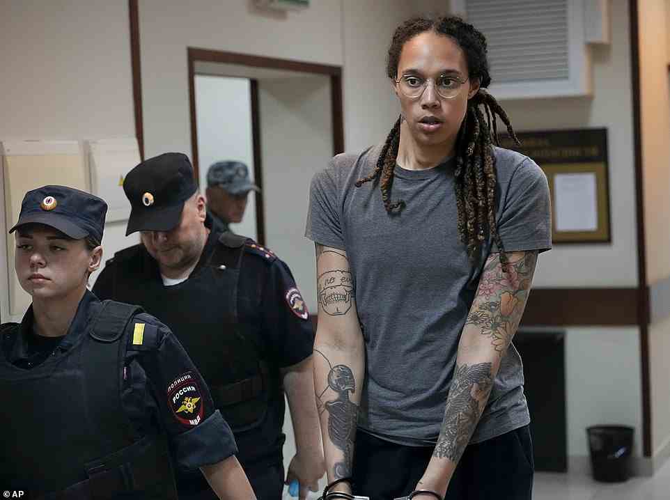 Griner is escorted from a courtroom after a hearing in Khimki just outside Moscow, Russia, on August 4
