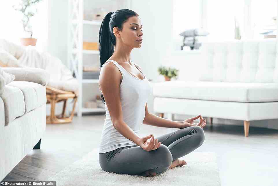 Yoga can help reduce symptoms of stress and anxiety. It is especially beneficial to people who are suffering from post traumatic stress disorder (file photo)